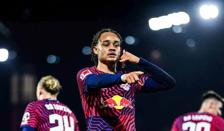 Xavi Simons does the "phone call" hand signal after presumably scoring a goal. (Photo)