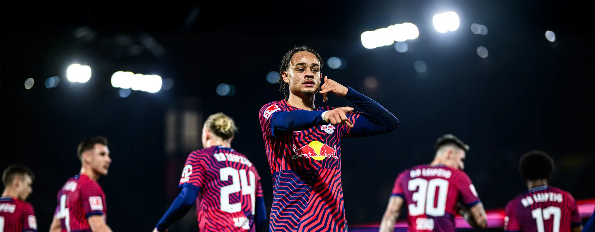 Xavi Simons does the "phone call" hand signal after presumably scoring a goal. (Photo)