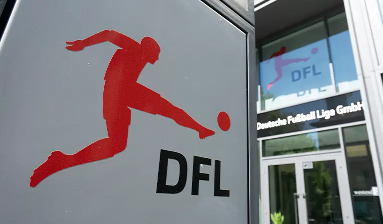 Entry sign with the DFL logo and a glass entryway visible to the office in the background. (Photo)