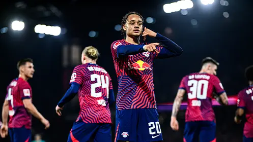 Xavi Simons does the "phone call" hand signal after presumably scoring a goal. (Photo)